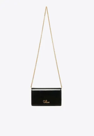 Iconic Logo Chain Clutch in Patent Leather