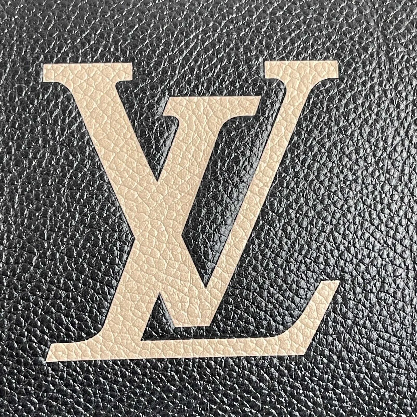 Louis Vuitton Bi-Color Monogram Empreinte Multi Pochette