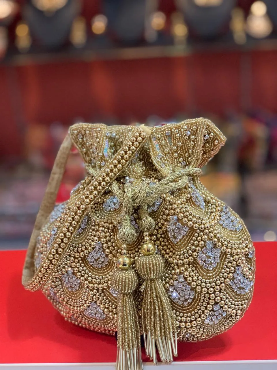 Unique Party Potli Purse in Cream